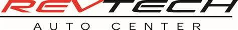 RevTech Auto Center logo featuring red and black text on white background